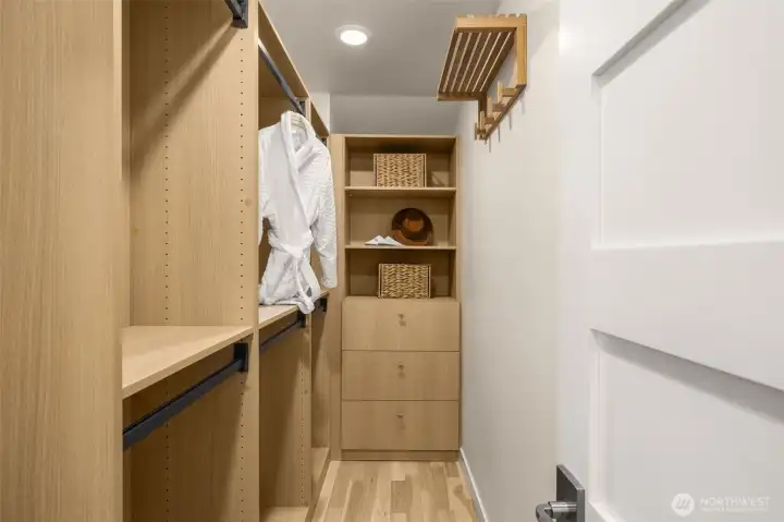The primary suite features a walk-in closet with built in storage, organize your wardrobe easily!