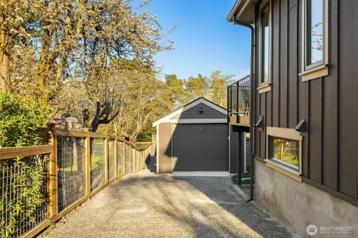 Featuring a detached garage, perfect for a weekend cruiser or additional storage