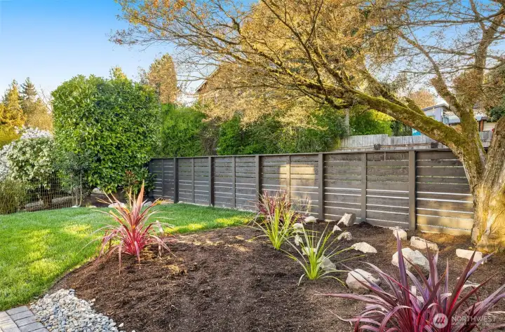 The property comes fully landscaped and prepped for gardening or easy maintenance