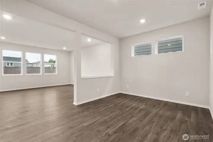 Open-concept dining room and living room. Photos are representative only and may display different color packages and/or upgrades.