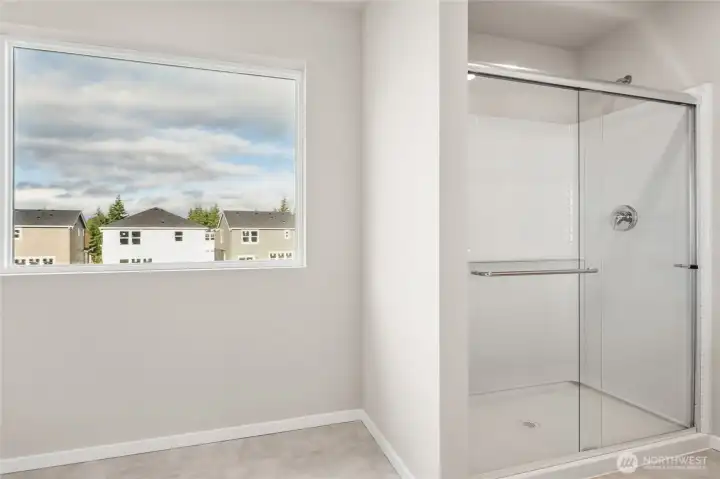 Primary bathroom walk-in shower. Photos are representative only and may display different color packages and/or upgrades.