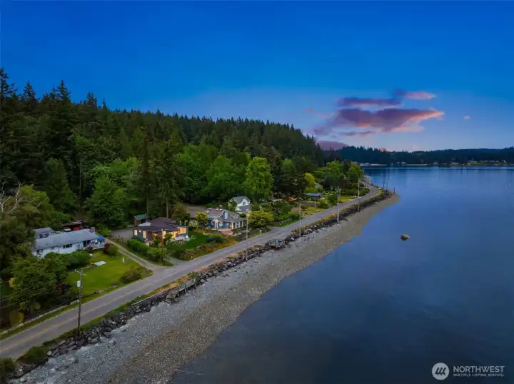 This modern one-level home sits on 101 feet of bulkheaded waterfront. This modern one-level home sits on 101 feet of bulkheaded waterfront.