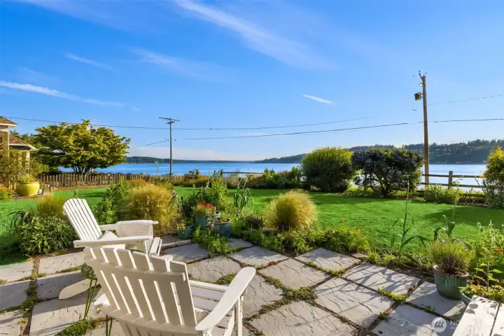 The home has a warm front patio and deck. The home has a warm front patio and deck.