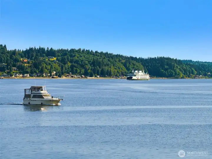 Watch the Bremerton ferry and afternoon boaters cruise by. Watch the Bremerton ferry and afternoon boaters cruise by.