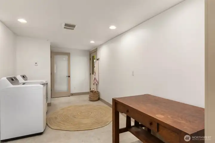 The large utility room at the back of the house. The large utility room at the back of the house.