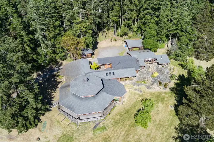 Aerial main home, garage, barn