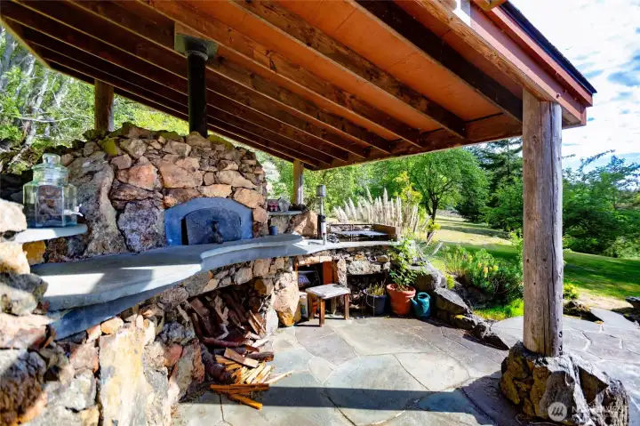 Pizza oven looks west