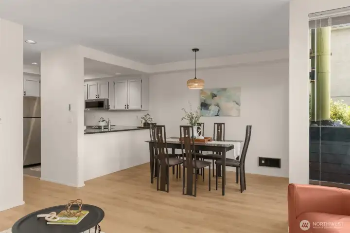 Dining area has slider leading out to the deck