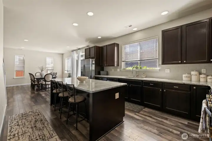 Kitchen opens to dining room with large island Kitchen opens to dining room with large island