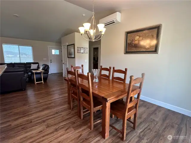 Dining area from sliding door and kitchen area.