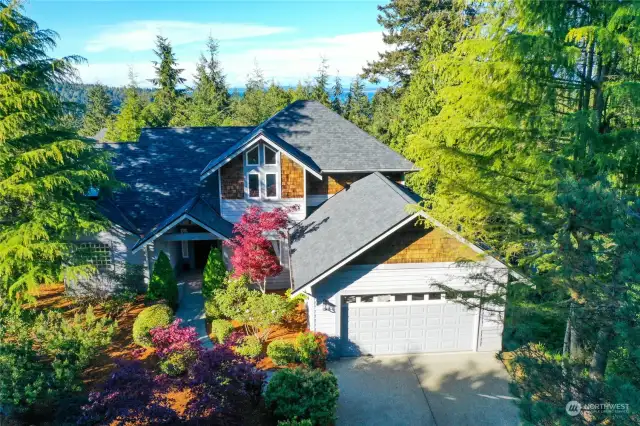Your custom built home on a large, private lot in desirable Port Ludlow awaits you!