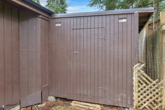 Storage shed attached to house.