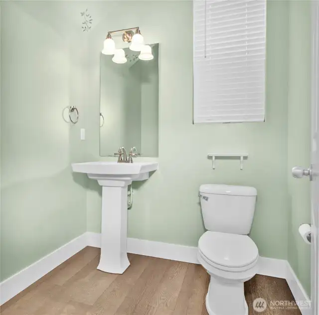 A convenient powder room on the main level for guests.
