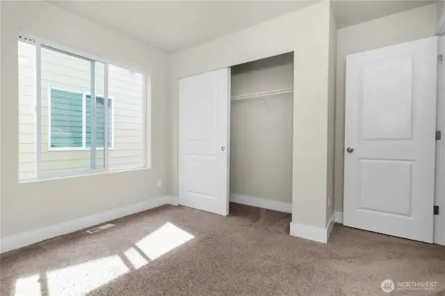 Each bedroom includes a spacious closet for storage.