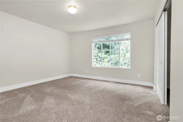 The second bedroom - Great-sized bedroom ideal for guests or a shared space and has a beautiful view. This space is large enough that it could be a second upstairs living area.
