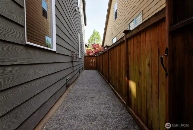 Along both sides of the home you have storage. One side has a sidewalk all along the home.