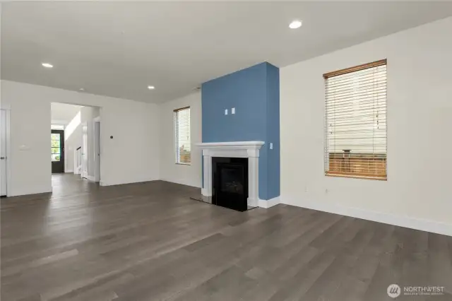 Bright and inviting living room with cozy gas fireplace—perfect for relaxing or entertaining. It is also TV ready.