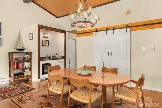 Generous dining space idedal for entertaining with convenient access to wet-bar and kitchen.