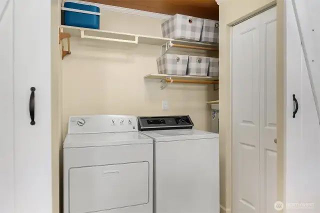 In-unit washer and dryer featured in laundry area off of kitchen & dining room.