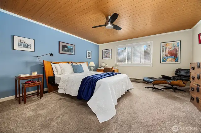 Bedroom with large windows providing ample natural light throughout.