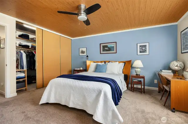 Bedroom featuring large closet offering room for storage and functionality.