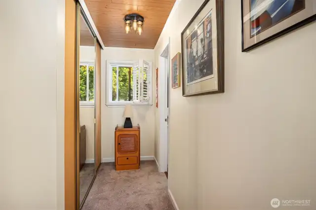 Convenient hallway closet adding extra storage space.