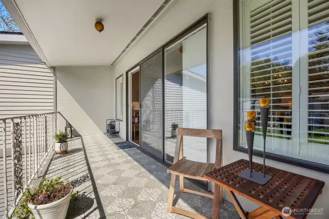 Large deck off of living room providing additional living space.