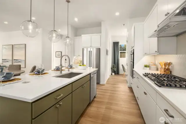 Kitchen with pendant lighting and gas cooktop.Photos are for illustrative purposes