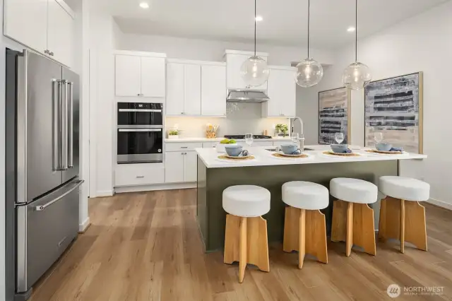 Kitchen includes refrigerator.  Photos are for illustrative purposes