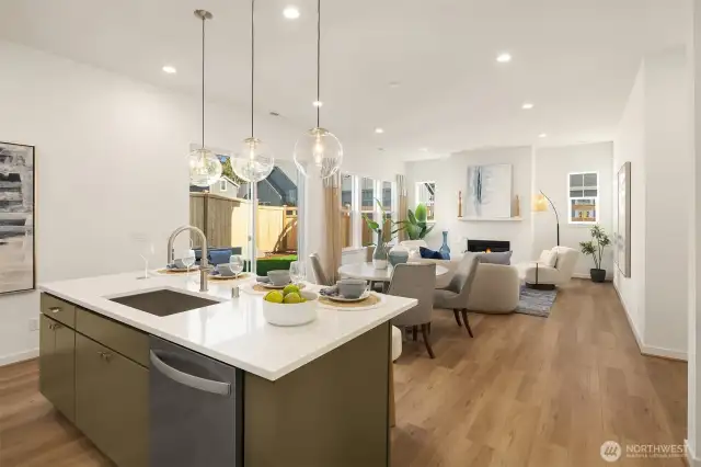 Kitchen Island and great room.  Photos are for illustrative purposes