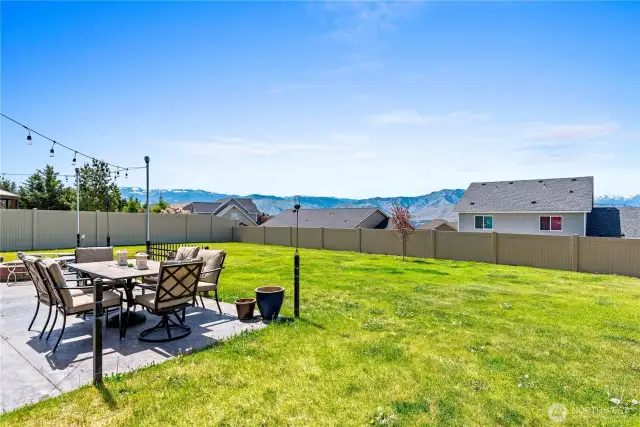 Nice fenced large backyard with stamped cement patio with Beautiful Views