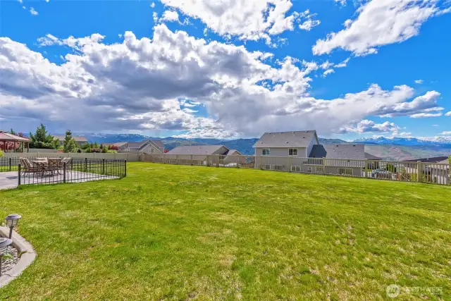 Nice fenced large backyard with stamped cement patio with Beautiful Views