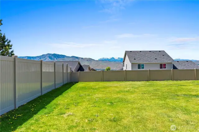 Nice fenced large backyard with stamped cement patio with Beautiful Views