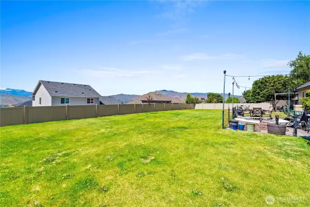 Nice fenced large backyard with stamped cement patio with Beautiful Views
