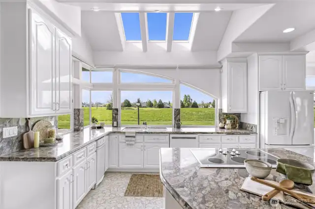 An entertainer's dream Kitchen with gorgeous views no matter where you stand