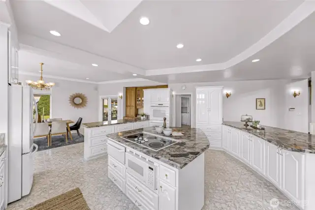 Large custom island with additional seating