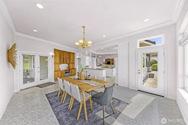 Seamless indoor/outdoor living with french door access to the back patio off the large eating space