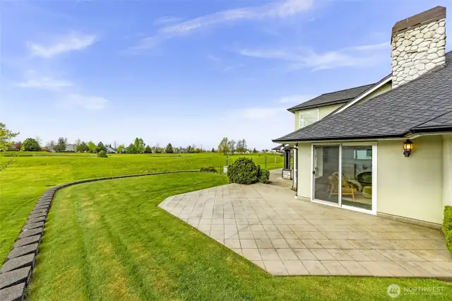 Property is over a half acre, with numerous patios