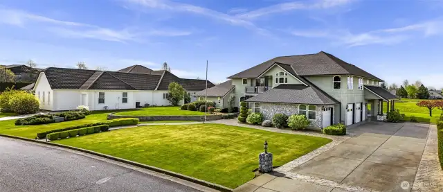 Oversized driveway and 3 car garage