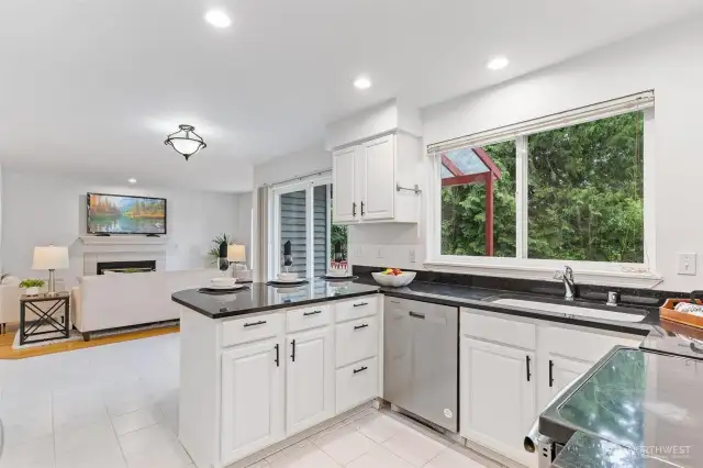 The kitchen is open to the family room for easy flow gatherings.