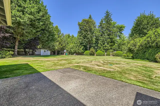 Imagine entertaining, relaxing and playing games in this expansive backyard with its large patio and complete privacy.
