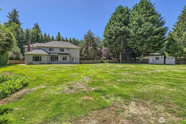 Another look toward the back of the house.  New grass seed was just planted and should fill in those bare areas soon.
