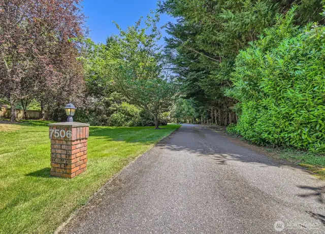 Enter this home down a private lane, completely hidden from the street.