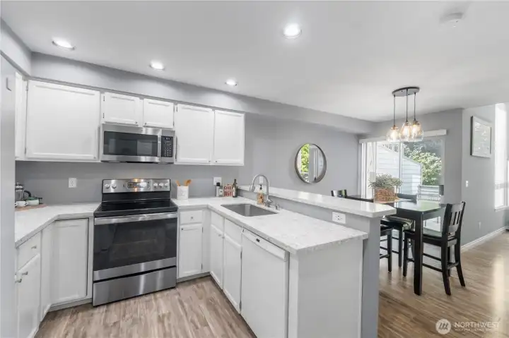 Kitchen is open to the dining area and living room