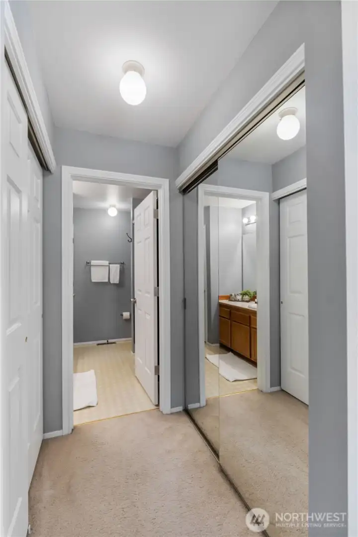 Dual closets off primary bedroom