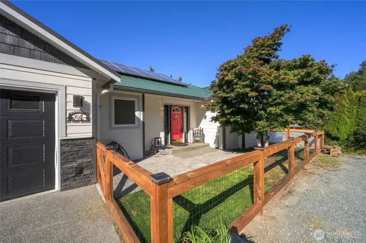 This home offers main level living with extra living space on lower level and plenty of extra parking below.
