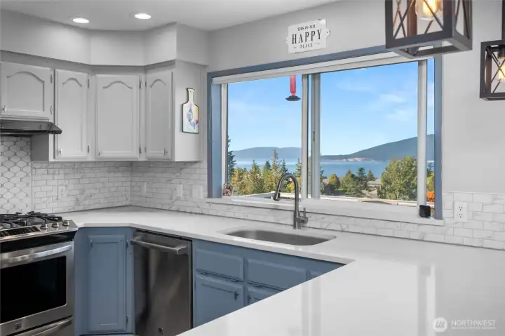 The views can be captured while cooking in this updated kitchen.