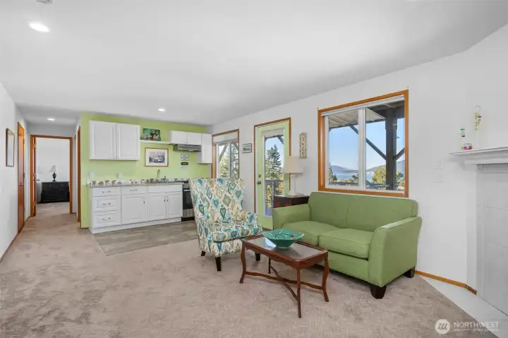 Lower level space features 2 bedrooms along with a kitchen area and a full length deck to enjoy the views.