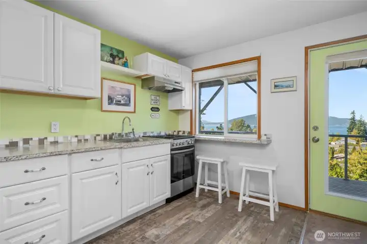 The lower level has it's own access from the side of the home.