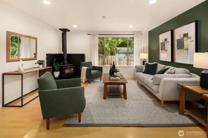 Spacious living room with large windows.